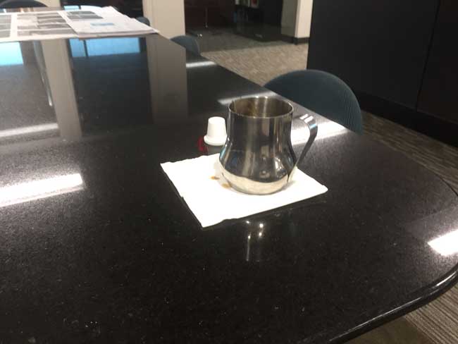 Cafecito serving carafe on a conference table top